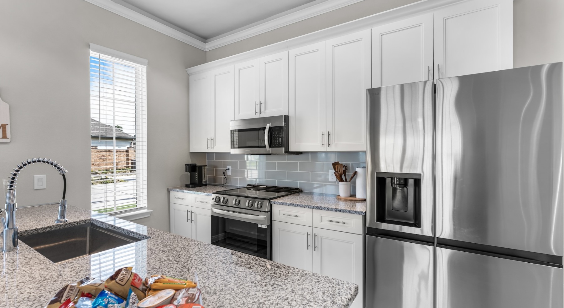 Well-lit kitchen with ample counter space