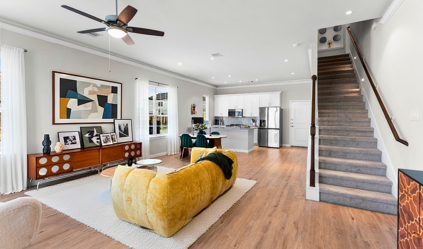 a living room with a couch and a tv